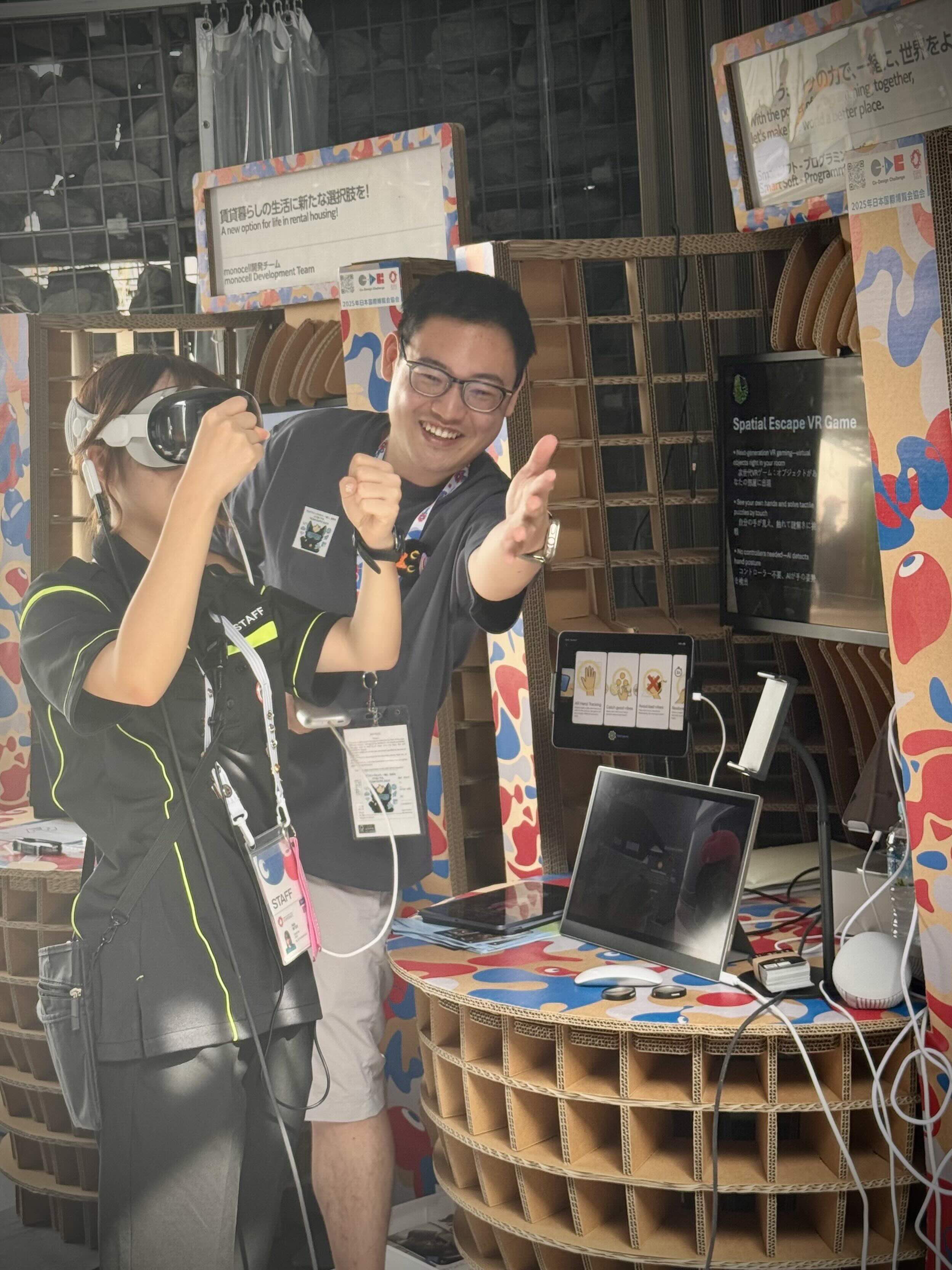 Visitor trying Vision Pro gaming at the Expo booth